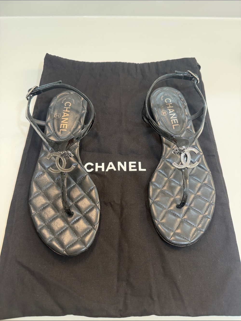 CHANEL Black Quilted Leather T-Strap Sandals with CC Logo